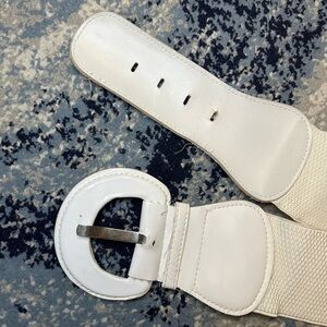 White stretchy belt with silver buckle